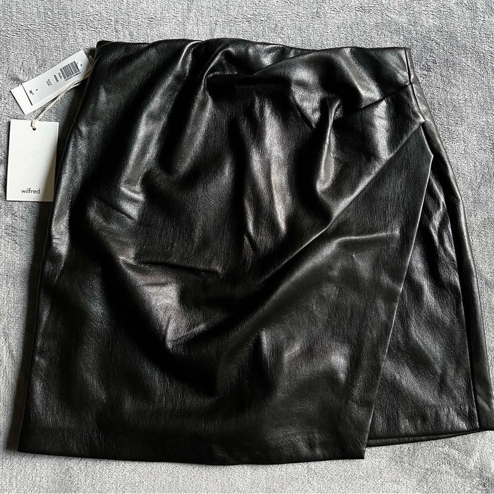 Bought this and then got one as a gift. Brand new, never worn, with tags!
